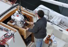 Lowering the Beta 20, the Kubota 722 block marinized by the British, to replace a Volvo MD7A two-cylinder. (Photo/ Bert Vermeer)