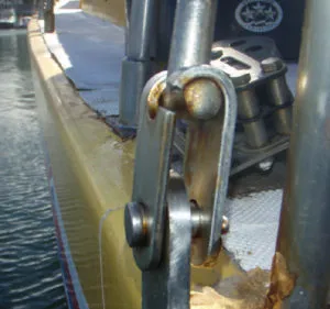 Broken, corroded stainless steel rig block. Notice the point where the part broke is a dark, damp spot that was out of sight and out of mind. 