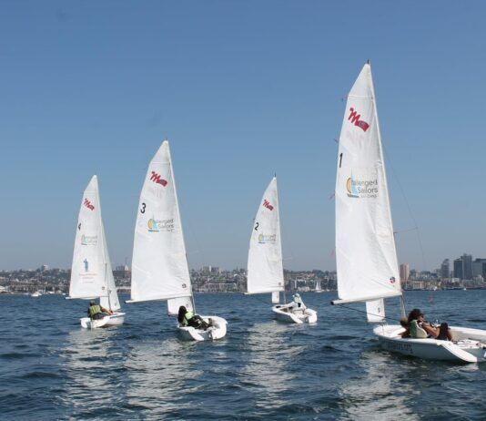 Half of the Challenged Sailors San Diego Martin 16 fleet on the San Diego Bay. (Photo/ Steven Vitela)