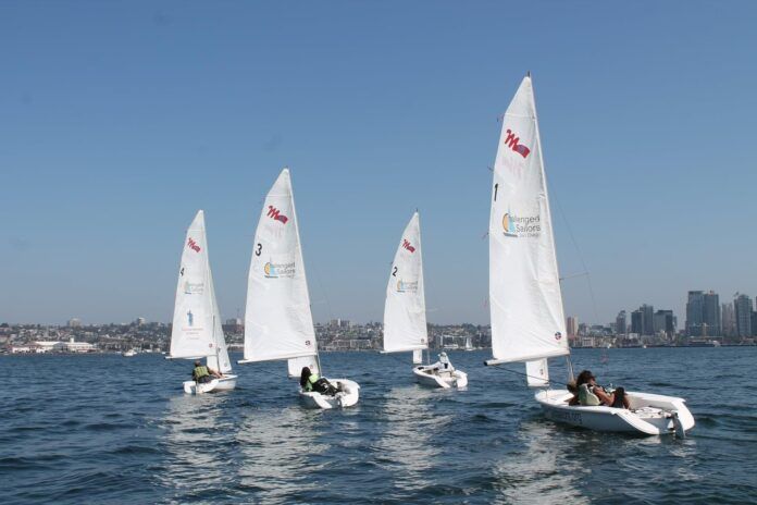 Half of the Challenged Sailors San Diego Martin 16 fleet on the San Diego Bay. (Photo/ Steven Vitela)