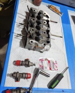 Yanmar 3GM30F cylinder head repair, a common job.