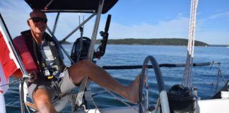 A cushioned seat in the pushpit allows for all kinds of steering options. Note the proximity of the sail controls to the helmsman's position. (Photo/ Bert Vermeer)