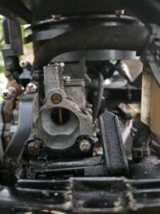 Cover carburetor inlet with hand to check for vacuum when starting. (Photo/ David Corrao)