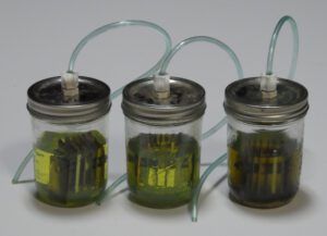 From left to right: diesel treated with STA-BIL Diesel (with 0.4% water added), control (no water added), untreated diesel (with 0.4% water added). Notice that STA-BIL Diesel stopped both corrosion and the reaction with the fuel. You can also see that corrosion of copper alloys, which results from even trace contamination, causes diesel to turn sludgy. This is why copper corrosion inhibitors are often called metal deactivators. (Photo/ Drew Frye)