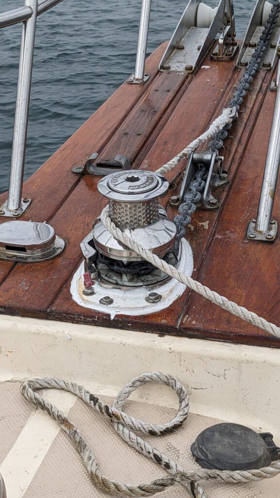 The salvaged windlass drum gypsy with a new electric motor installed below. With newly caulked G-10 plates, this engine will be protected from water corrosion. (Photo/ Alison O'Leary)