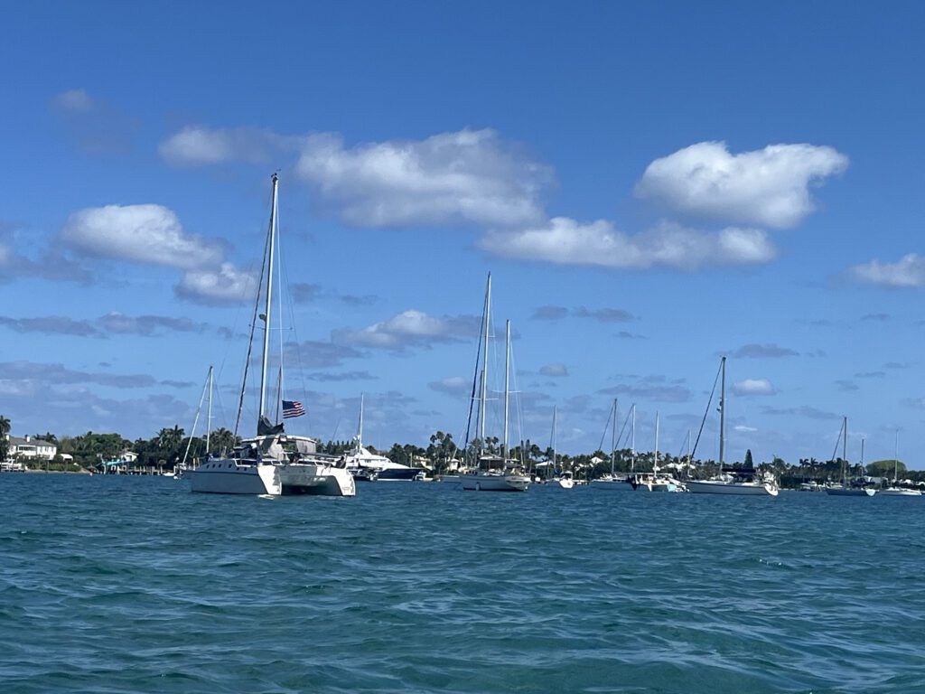 My little catamaran at anchor in Lake Worth in Florida (MM 1018) where I exited the ICW when heading south and re-entered when heading north. This is a free anchorage and there are lots of cruisers here. There are a few derelict boats and a few sunken boats. It's not easy to access the shore so we paid for a dinghy dock for a few hours. (Photo/ Alex Jasper)