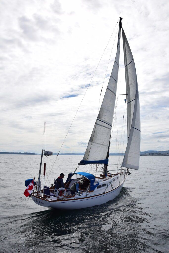 The extended stern overhang took advantage of 1960s racing rules that only factored in waterline length to determine a boat's handicap. However, at speed and heeling over, the boat's waterline lengthens, offering up higher performance. It also looks classy, even though it does sacrifice interior space. (Photo/ Bert Vermeer)