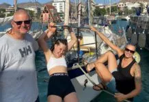 Leszek Wolnik, left, with granddaughter Reija, center, and crew Marija before their Atlantic crossing on a Vancouver 32. Reija and Marija had their hair braided in preparation for the voyage, while Leszek's hair was naturally voyage-ready. (Photo/ Leszek Wolnik)