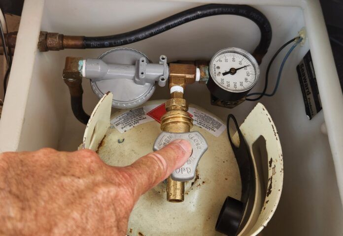 Propane tank valve and pressure gauge. Since a propane leak can be catastrophic, make sure to schedule in a propane tank and fitting check into your maintenance calendar. (Photo/ Marc Robic)