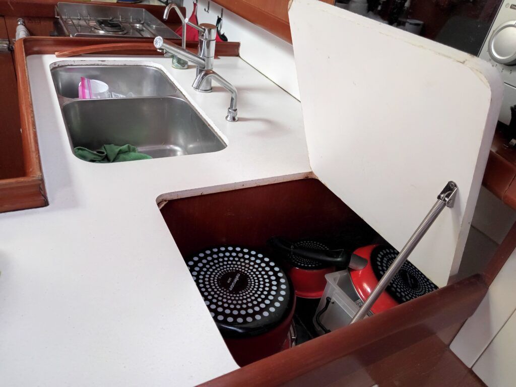 This was another professional job. Again in Cape Town, we replaced the whole bench top and had the carpenter cut the "pot hole." I did, however, install the spring. I also painted the edges with two-part white epoxy. (Photo/ Brett Campbell)