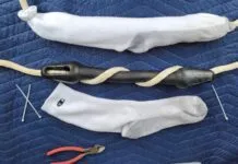 Mooring line with shock absorbers and sock sleeves. Plain, white socks keep the shock absorbers from marking your hull. (Photo/ Marc Robic)