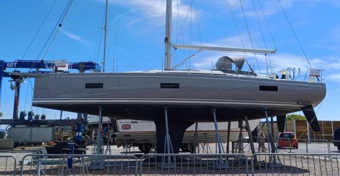 Beneteau First 44. A modern wide stern boat with a deep narrow fin and bulb plus twin rudders. Note the very shallow hulls as well. This design epitomizes the modern fast 