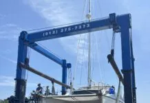 This flight in the travel lift from the water to the stands cost at Brunswick Landing Marina cost $814 with a pressure wash of the bottom included. (Photo/ Alex Jasper)