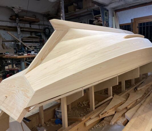 This Feinspiel Vendia boat is made from their proprietary Nordic pine plywood planks. The planks are made from sliced veneer so it looks like solid wood, but is actually ply. (Photo courtesy of Vendia)