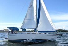 If you're looking for a roomy coastal cruiser and tend on the taller side, the Pearson 303's offers a solid build and 6-ft. 3-in. headroom. Photo courtesy of Sailboatlistings.com.