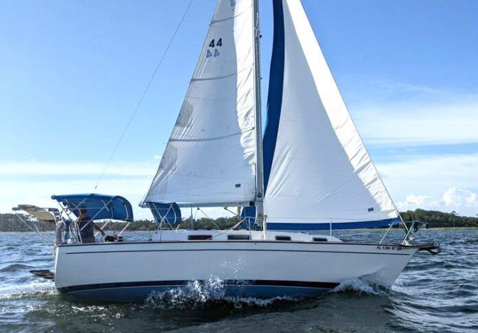 If you're looking for a roomy coastal cruiser and tend on the taller side, the Pearson 303's offers a solid build and 6-ft. 3-in. headroom. Photo courtesy of Sailboatlistings.com.