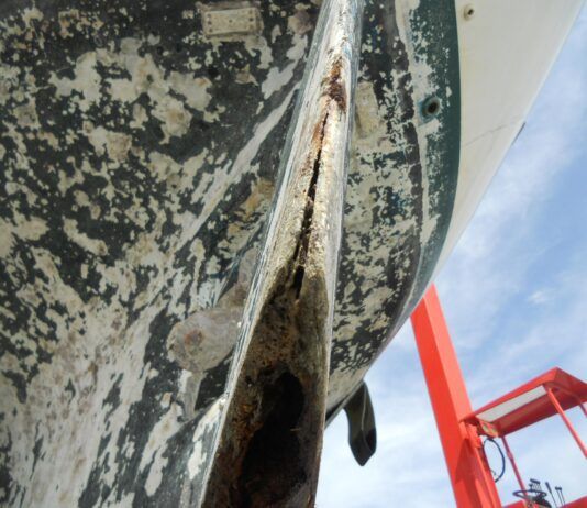 Although the cause of this delaminated rudder is unknown, In most cases the delamination comes with age. Also, a small nick from hitting a rock or coral will let water in and, if not attended too, the delamination will worsen in time. (Photo/ Ray Quenville)